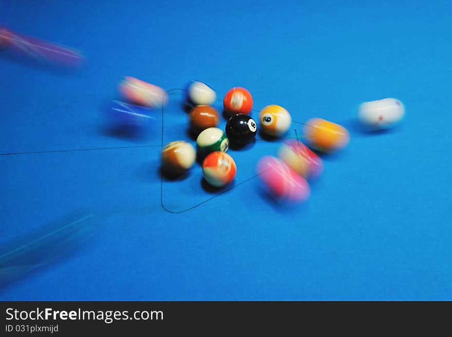 Young man play pro billiard game