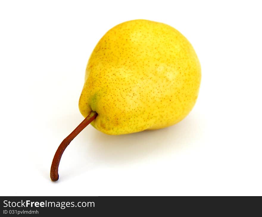 A single pear with a leaf isolated on white