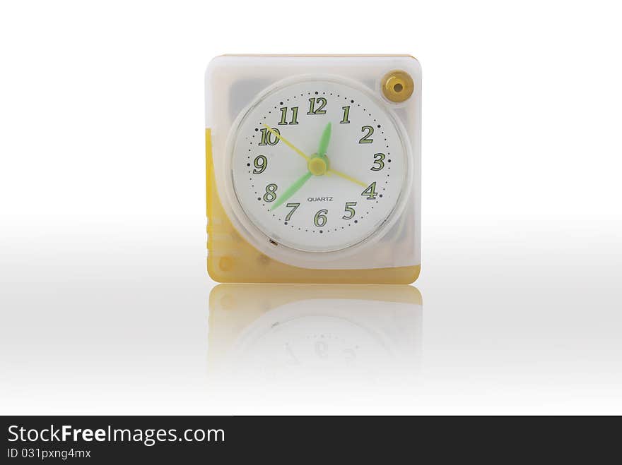 Quartz alarm clock on white background.