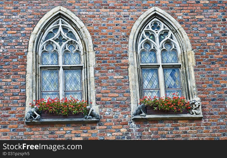 Beautiful portal windows and red bricks - architecture detail, made in Wroclaw