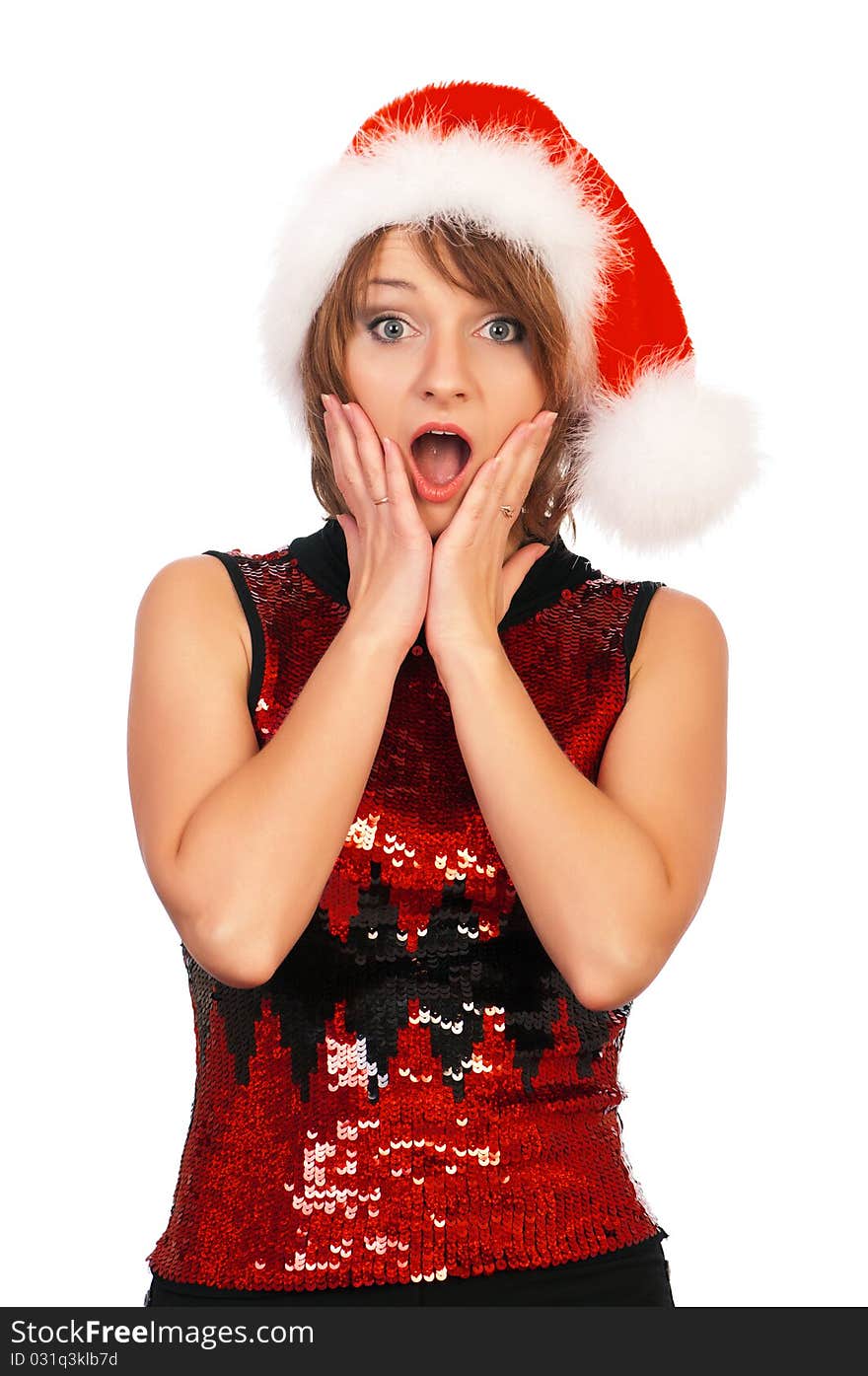 Portrait of a emotional beautiful christmas girl wearing Santa hat. Isolated on white background.