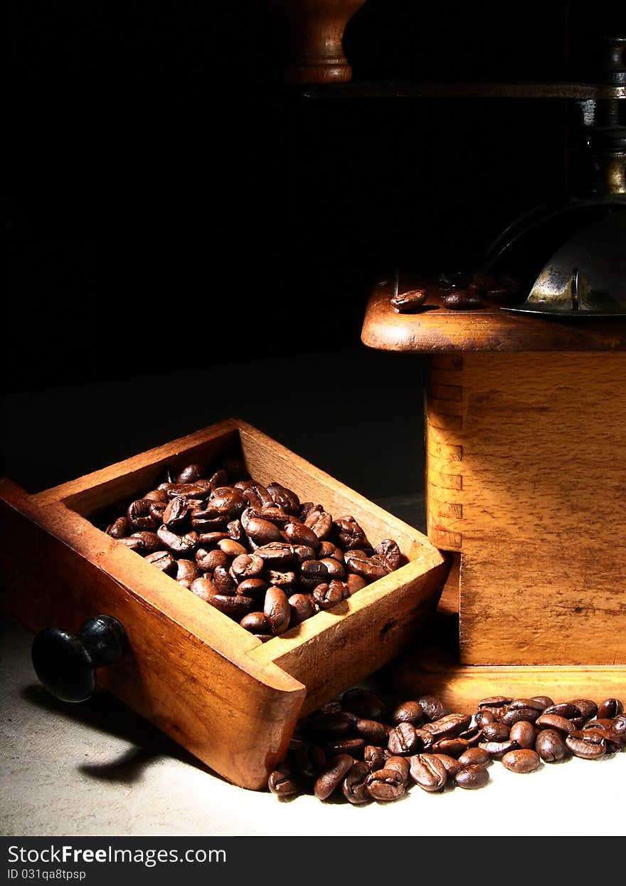 Coffee beans and old italian grinder. Coffee beans and old italian grinder