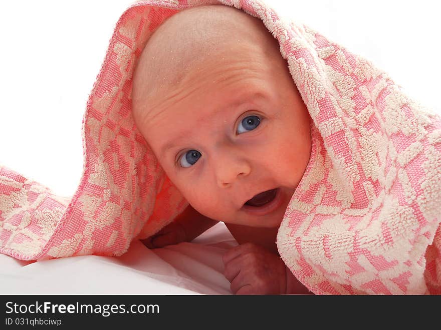 The small newborn child on a white background