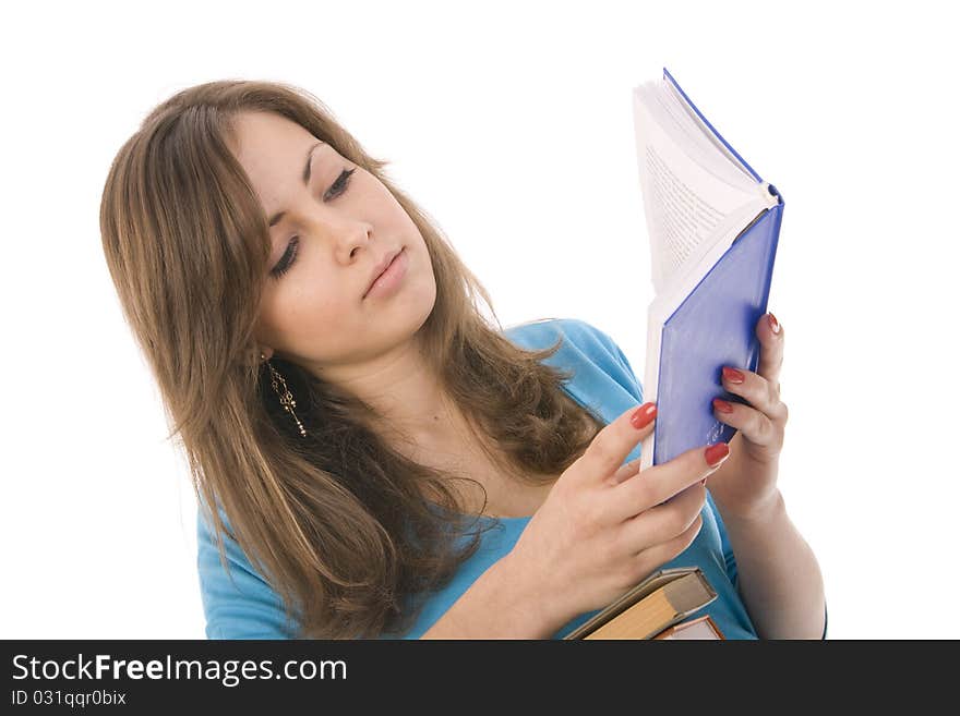 Beautiful girl thoughtfully reading a book