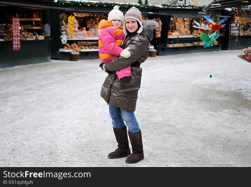 Young mother with amaze small daughter