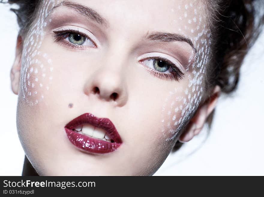 Beauty portrait of a young brunette girl with red lips. Beauty portrait of a young brunette girl with red lips