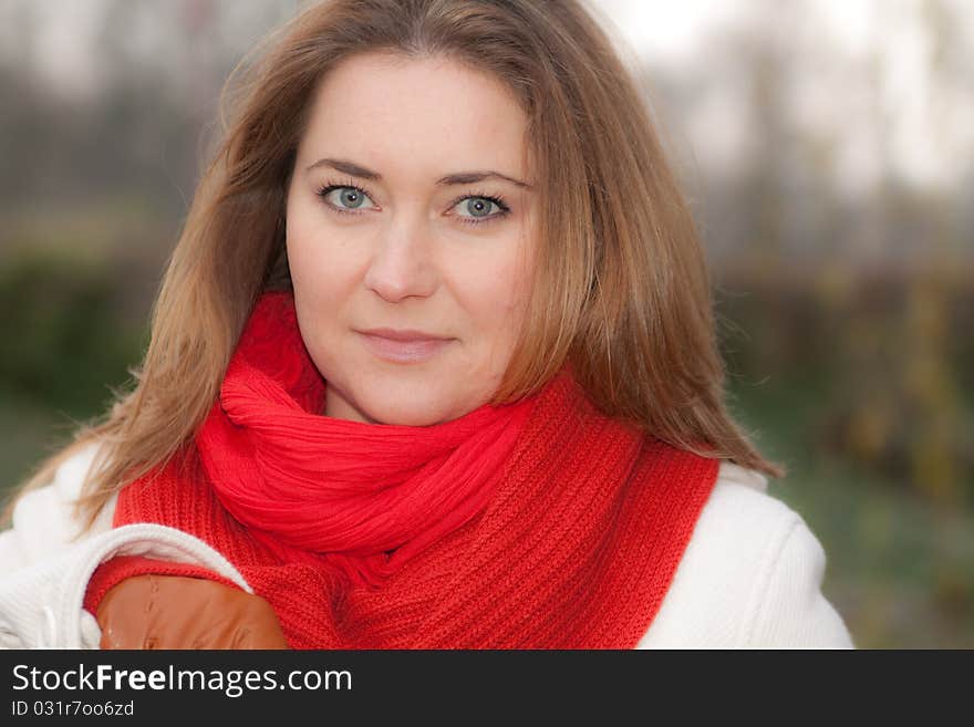 Woman wearing a red scarf