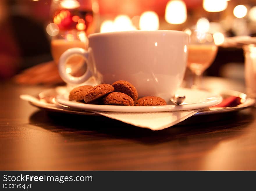 Cup coffee with cookies