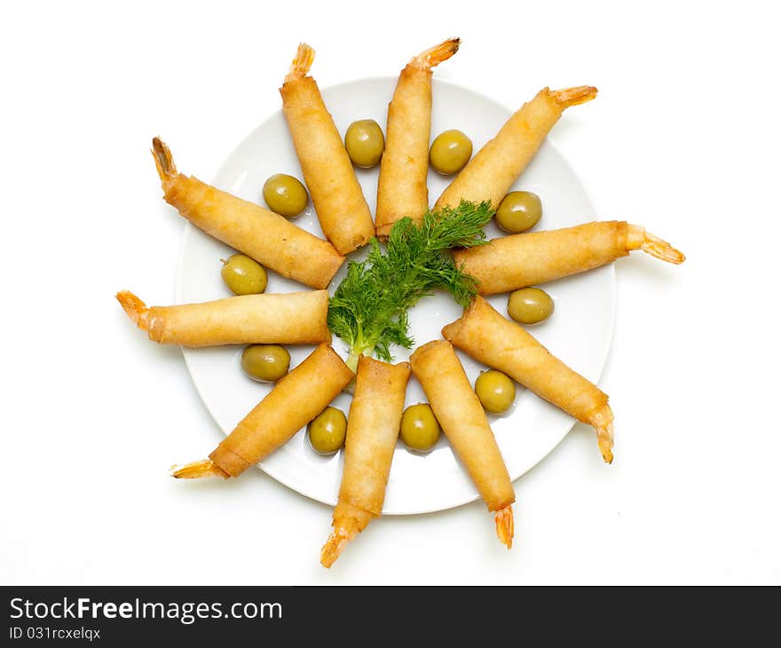 Shrimps in pastry on a plate