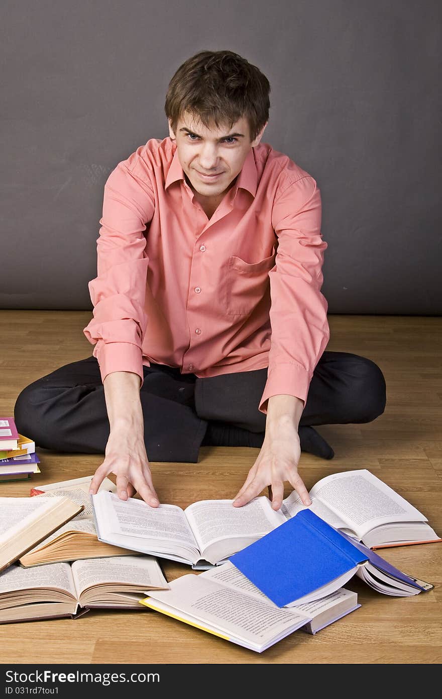 Young Boy Reading A Book