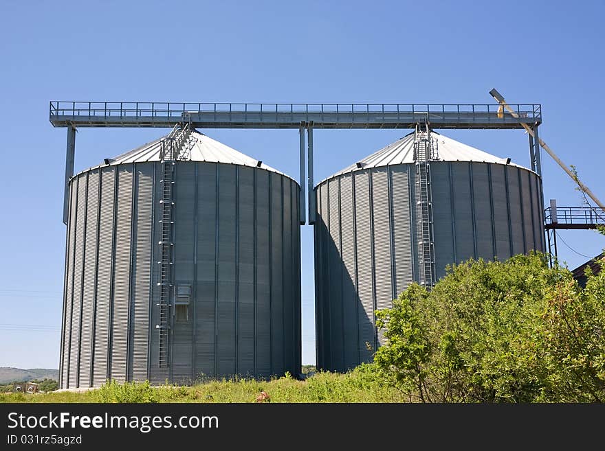 Storage silos for agricultural products, in the countyside. Storage silos for agricultural products, in the countyside