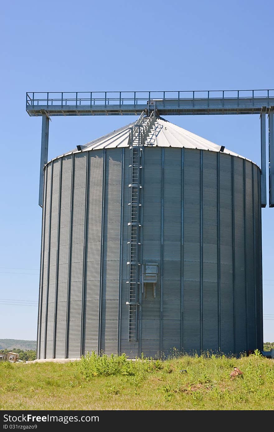 Storage silos for agricultural products, in the countyside. Storage silos for agricultural products, in the countyside