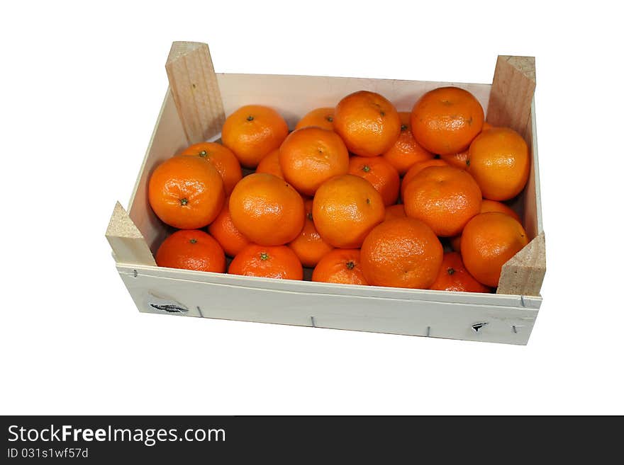 A big wooden box with oranges. A big wooden box with oranges