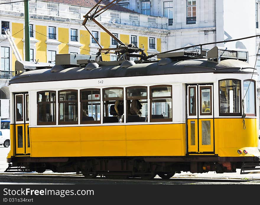 Working yellow tramcar in Lisbon, Portugal. Working yellow tramcar in Lisbon, Portugal