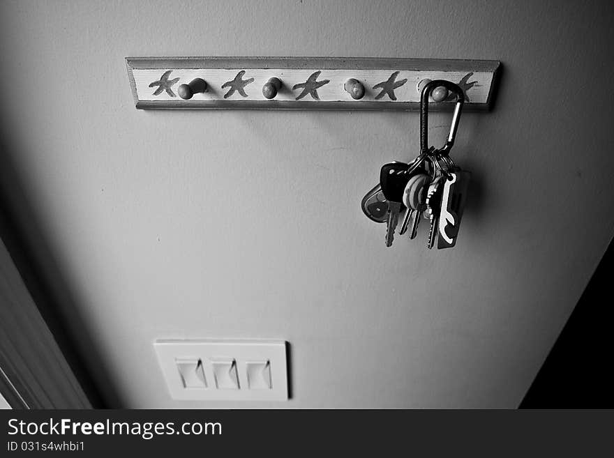 Keys hang on a rack, close-by and ready to go