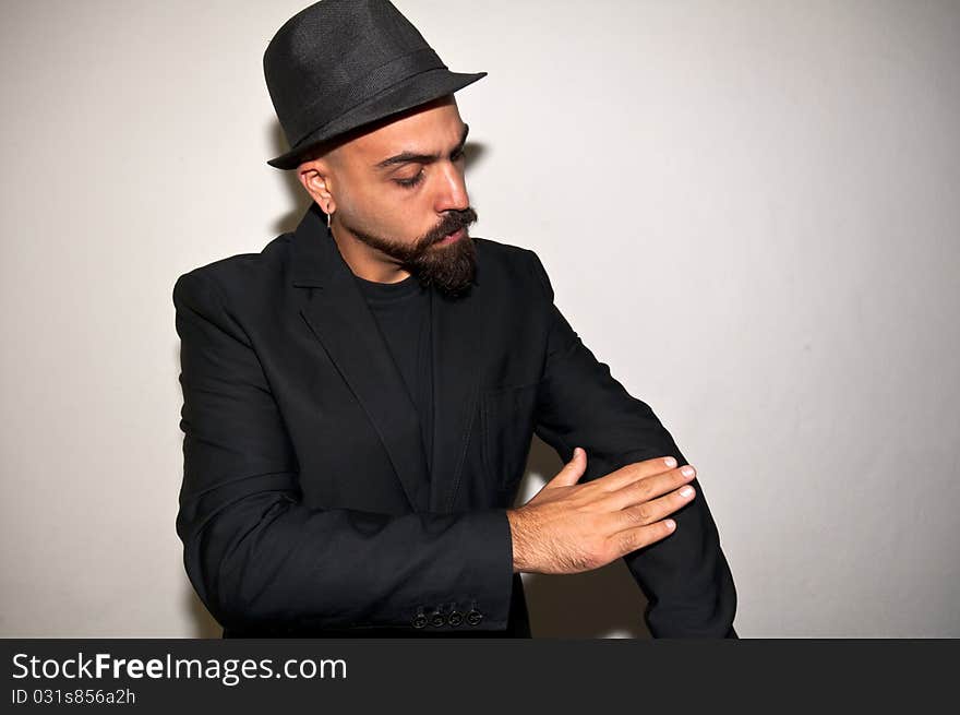 Man with black jacket cleans on white background