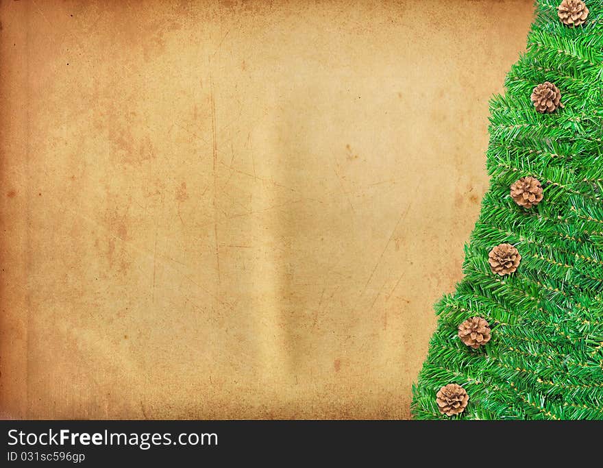 Christmas Tree Branches Bordering a ancient paper