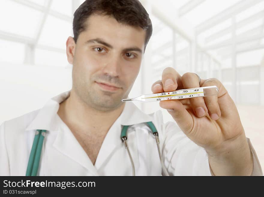 Medical doctor with thermometer