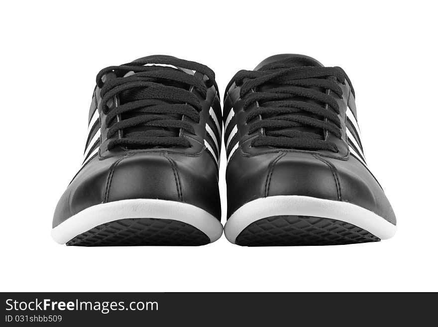 Black sneakers with white strips