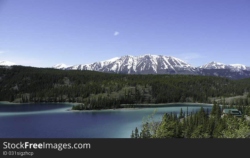 The beautiful green of Emerald Lake, located on the Klondike Highway in the Southern Yukon of Canada. The beautiful green of Emerald Lake, located on the Klondike Highway in the Southern Yukon of Canada.