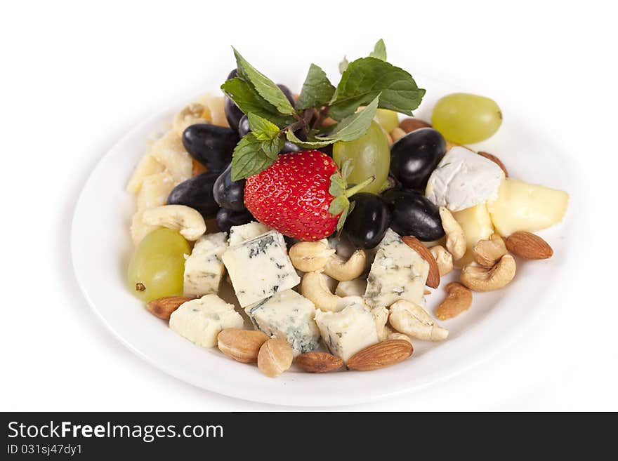 Cheese plate with grapes, nuts and strawberry. Cheese plate with grapes, nuts and strawberry