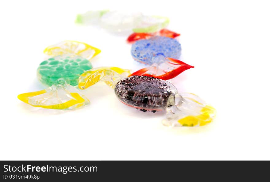 Glass candies isolated on white background.