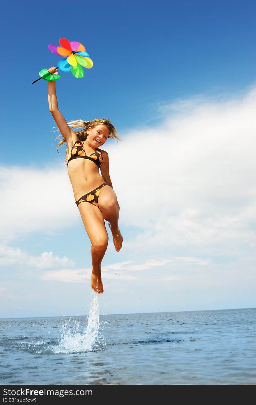 Happy Little Girl Jumping