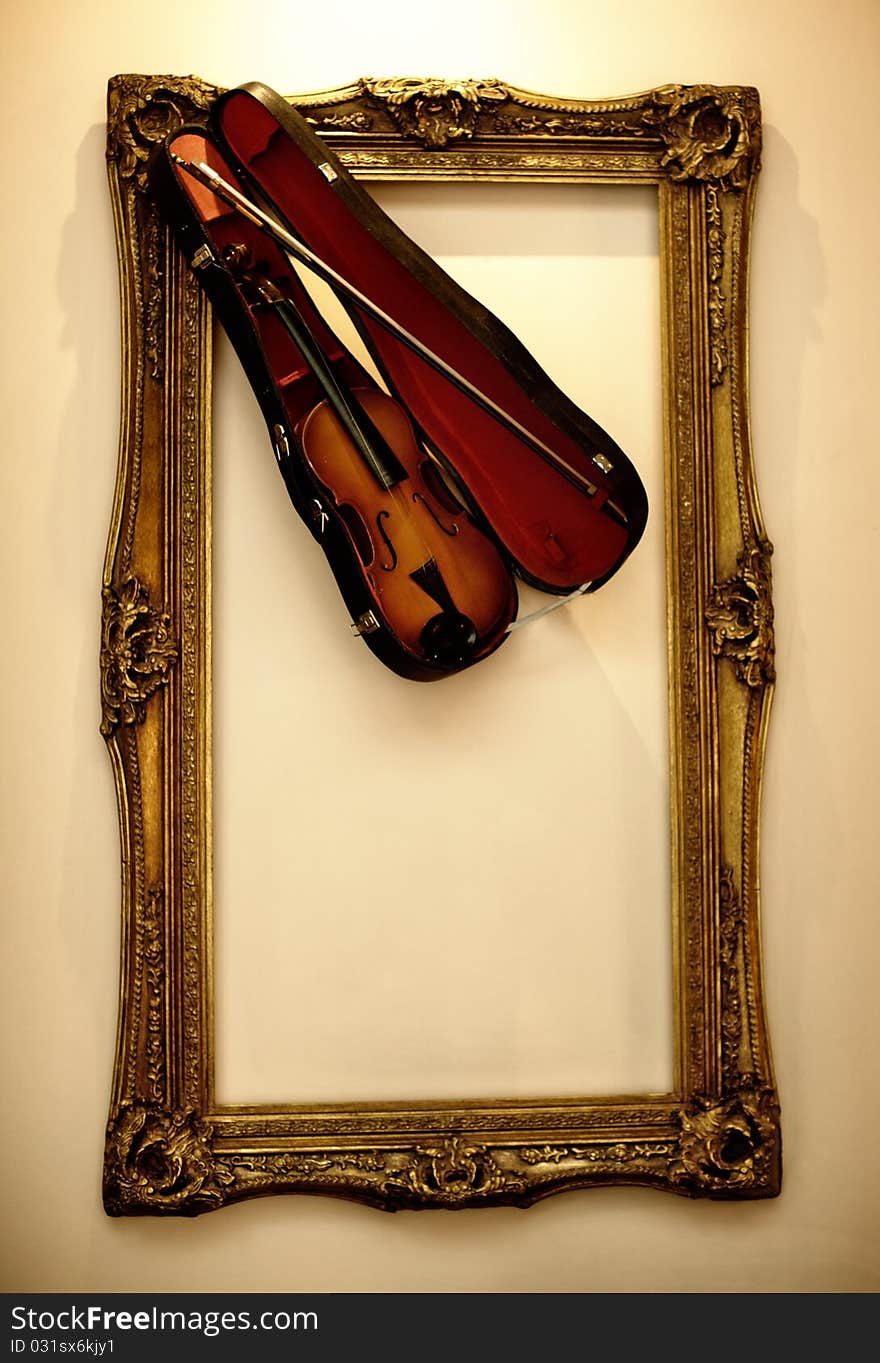 Picture frame with the violin