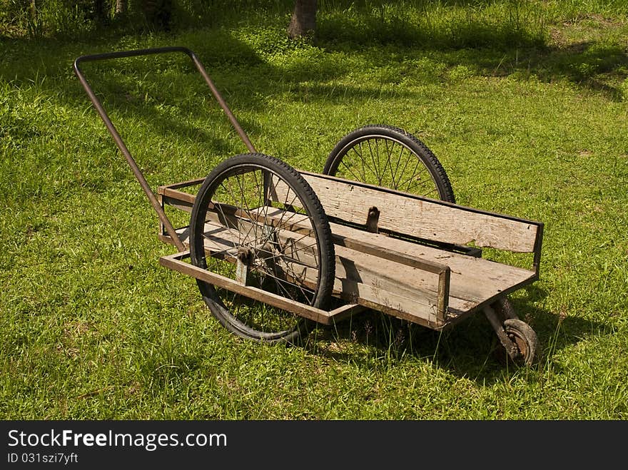 Wooden wheelbarrow or pushcart used by Thai Farmers