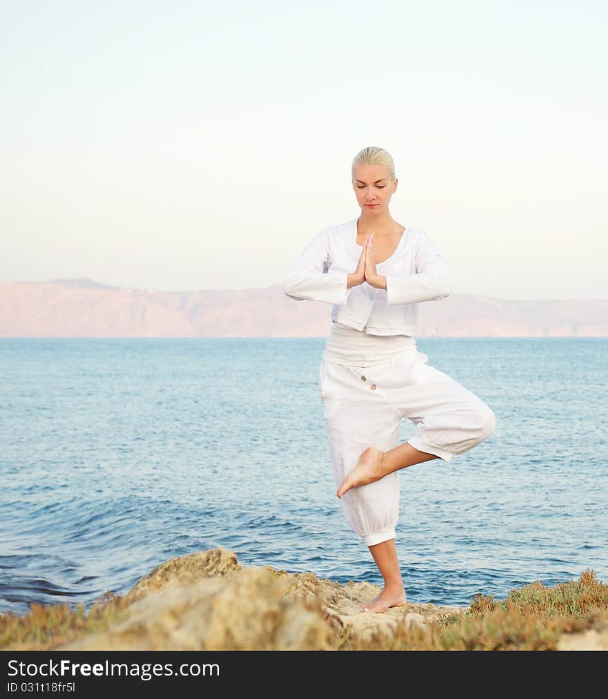 Beautiful Young Woman Doing Yoga Exercise