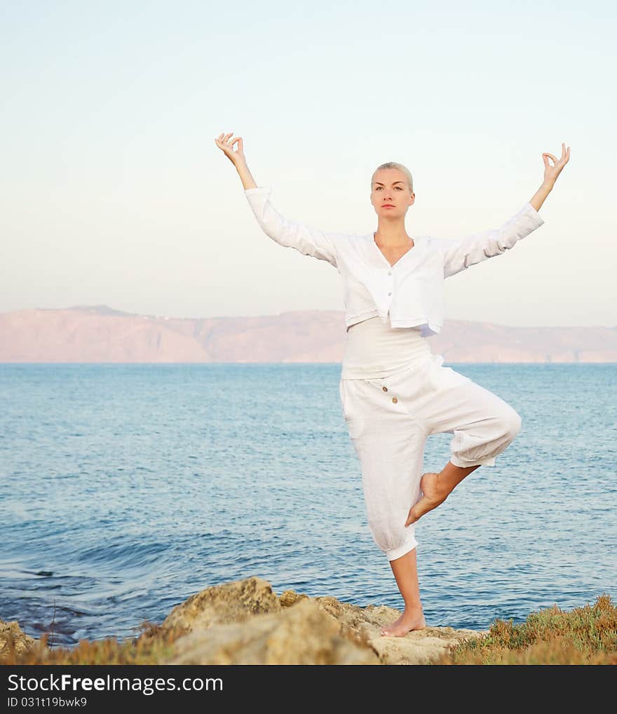 Beautiful Young Woman Doing Yoga Exercise