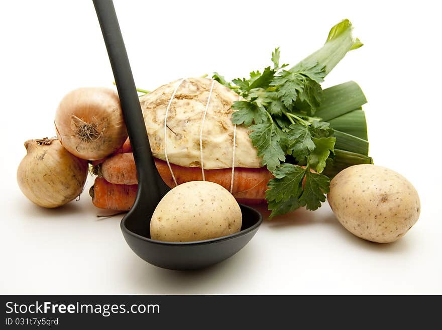 Soup vegetables with ladle