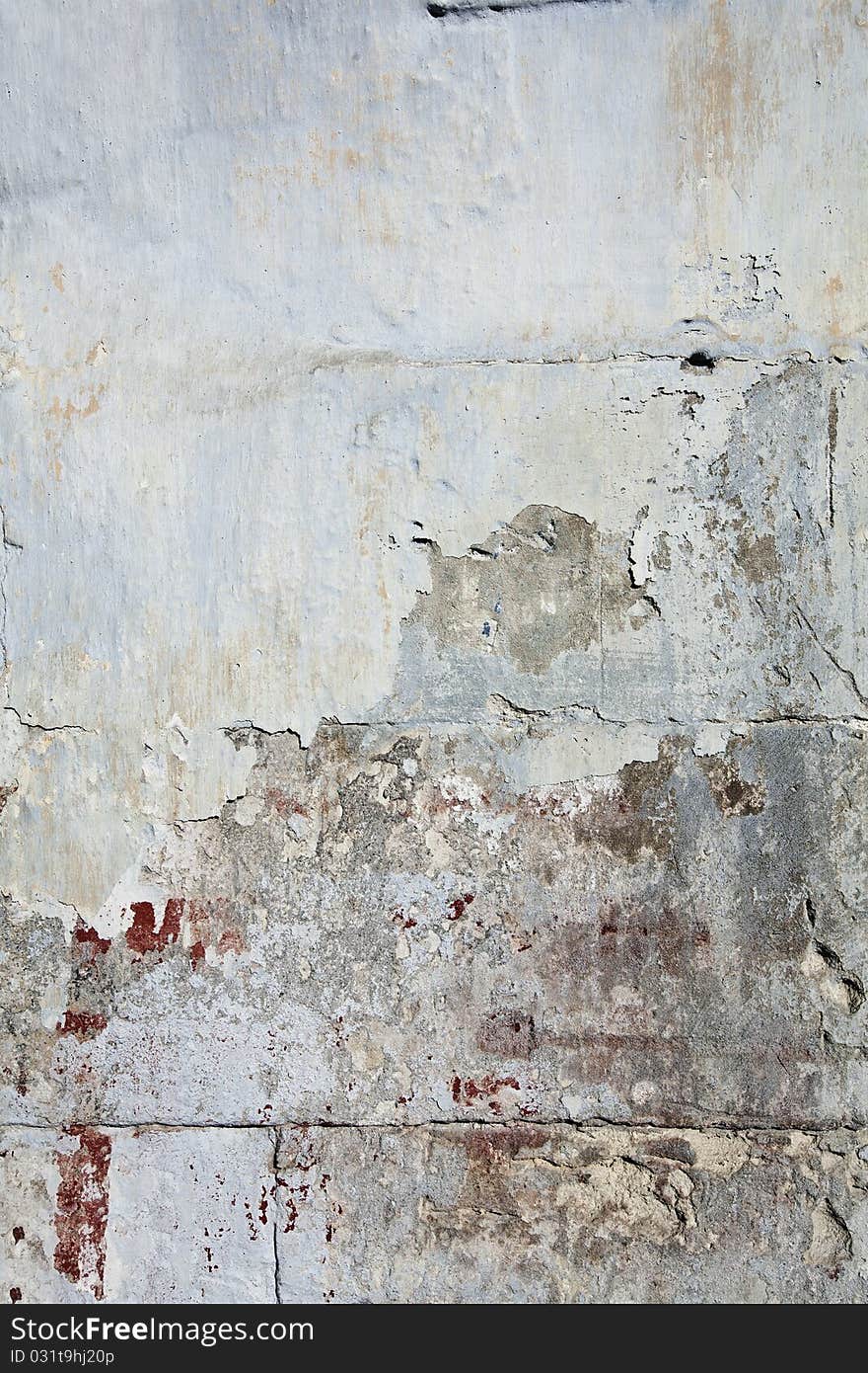 Weathered wall with bloody stains