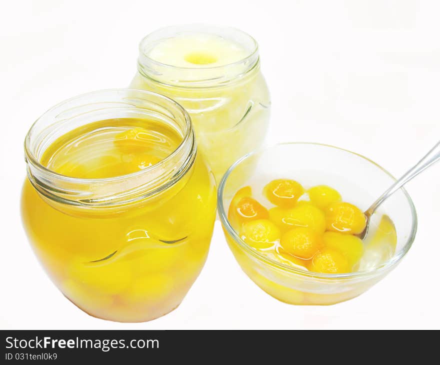 Papaya fruit in balls in syrup isolated. Papaya fruit in balls in syrup isolated