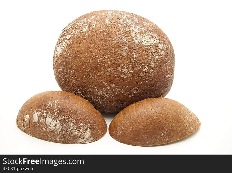 Round bread cut onto white background