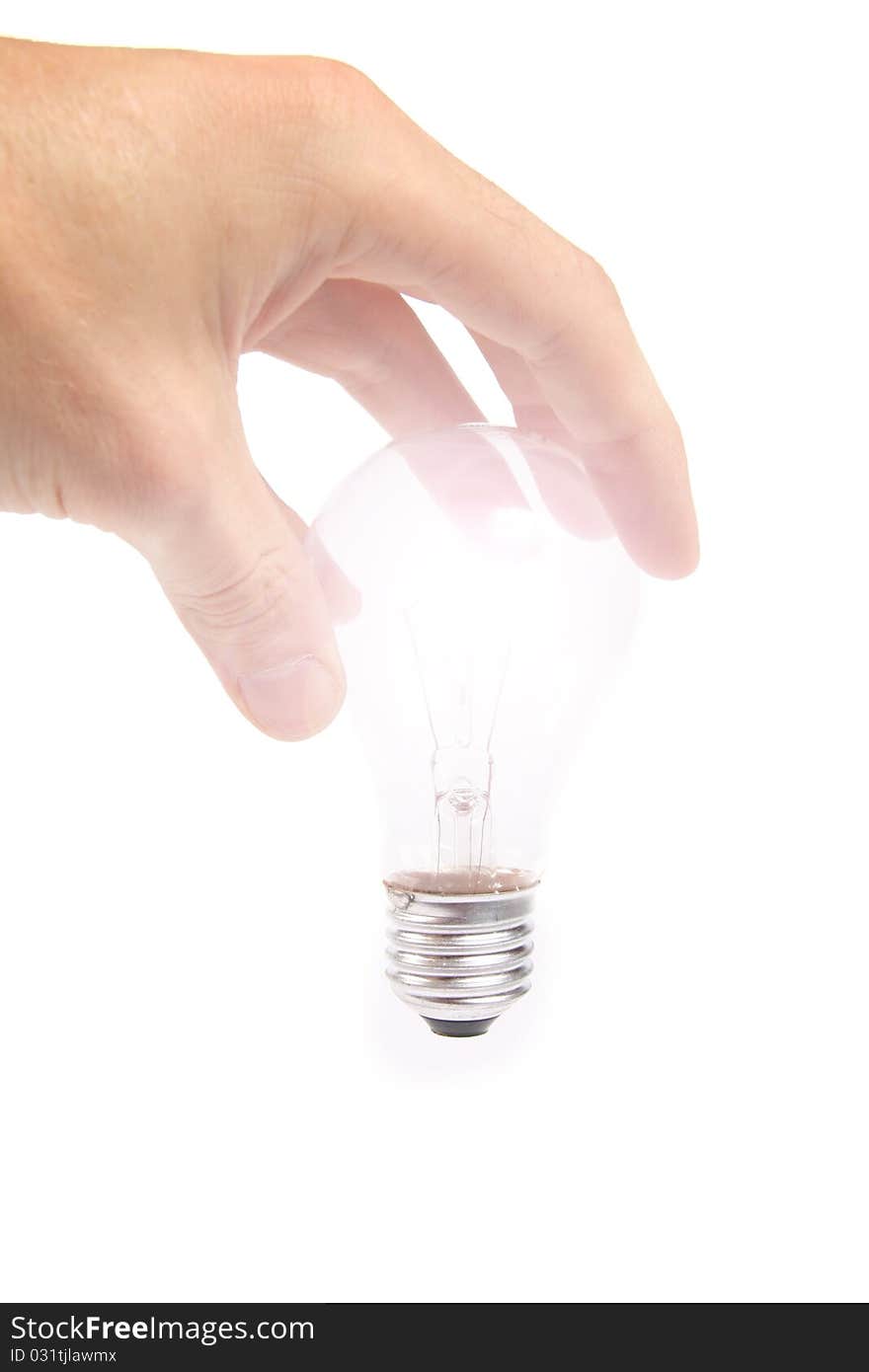 Glowing bulb in the hand isolated on white