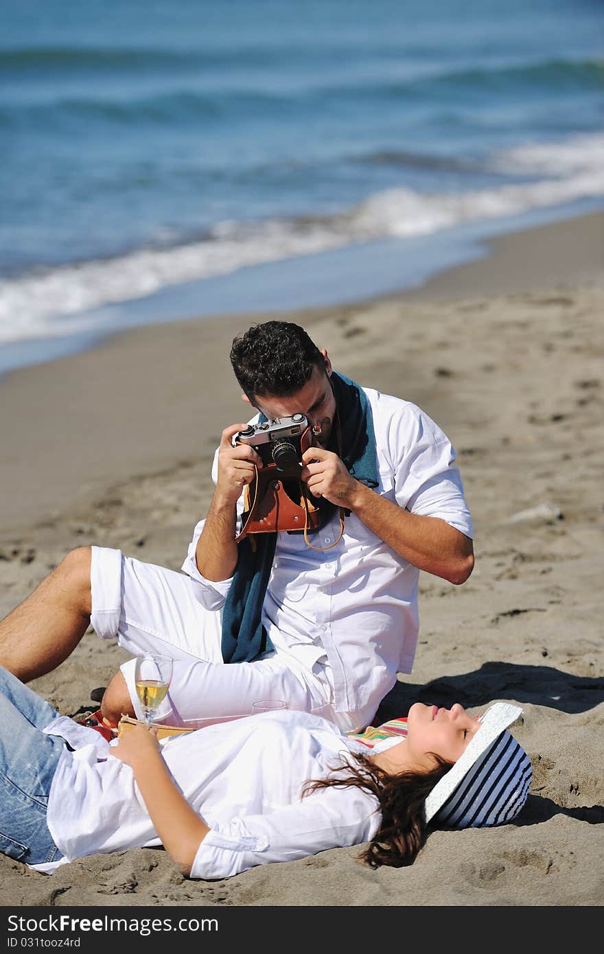 Happy young couple in white clothing  have romantic recreation and   fun at beautiful beach on  vacations. Happy young couple in white clothing  have romantic recreation and   fun at beautiful beach on  vacations