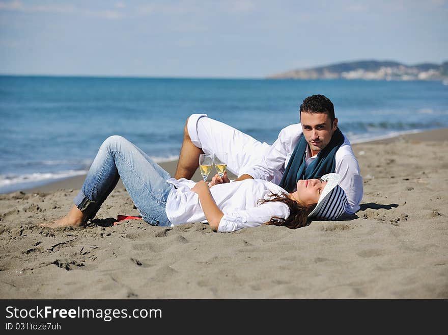 Happy young couple in white clothing  have romantic recreation and   fun at beautiful beach on  vacations. Happy young couple in white clothing  have romantic recreation and   fun at beautiful beach on  vacations