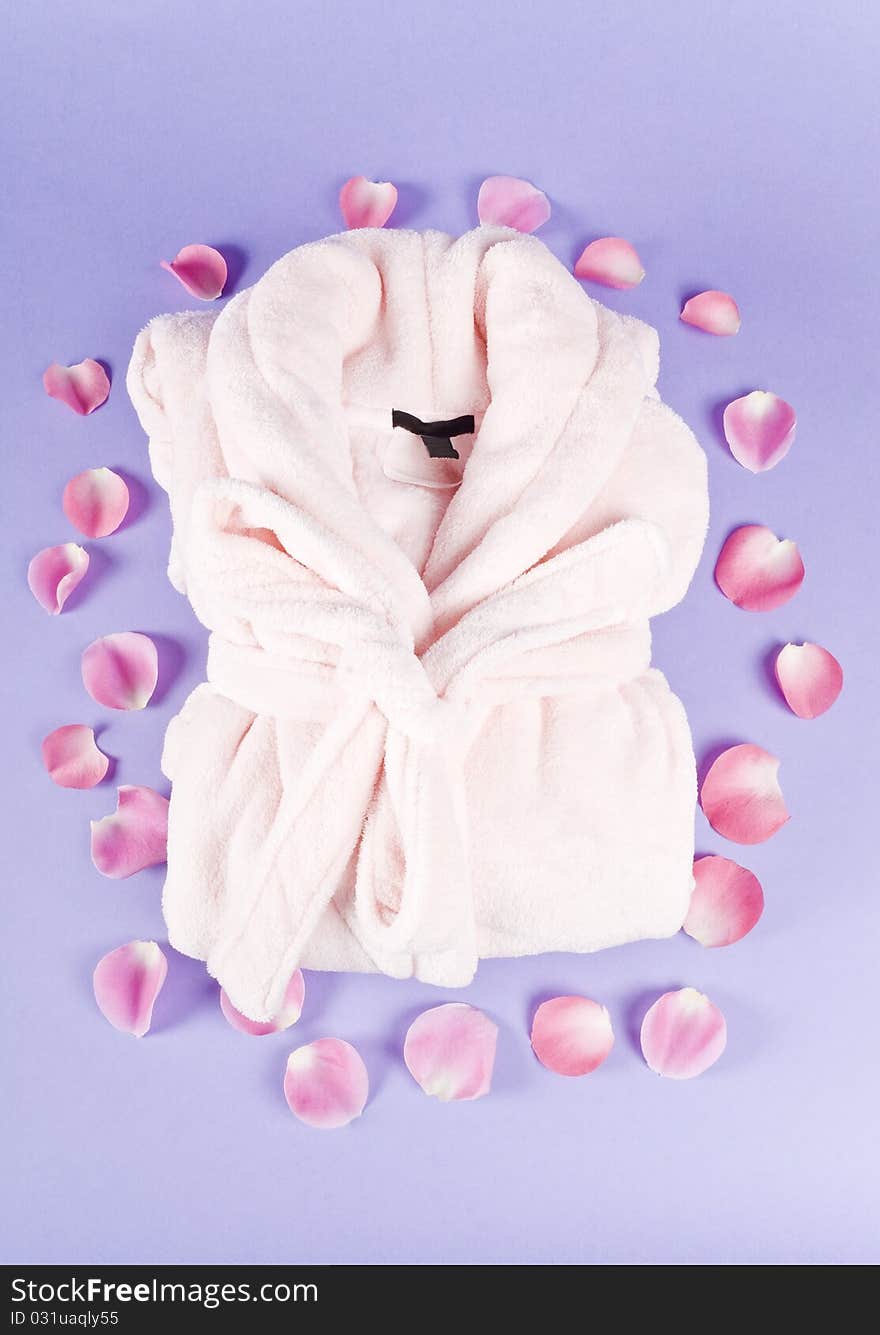 Pink Bathrobe Surrounded with Rose Pedals