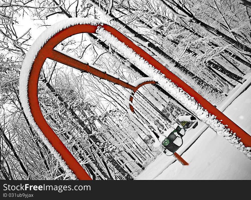 Empty Swing on wintery playground. Empty Swing on wintery playground