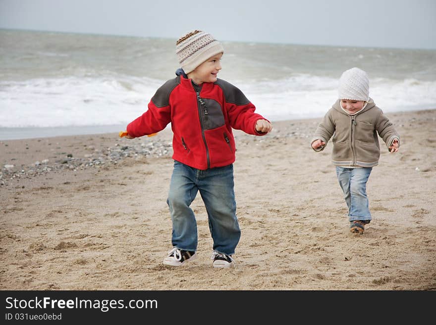 Children running on beach