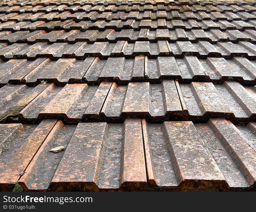 Background of old tiles on a roof