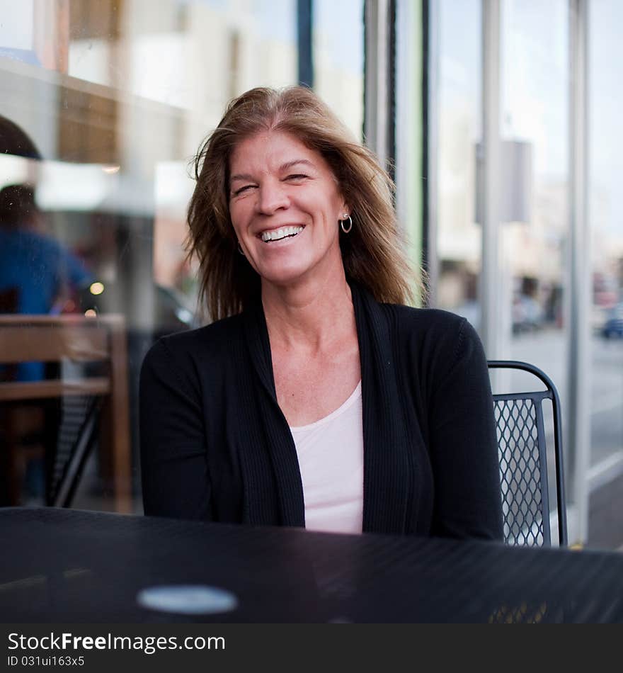 Happy, beautiful older woman in the city. Happy, beautiful older woman in the city.