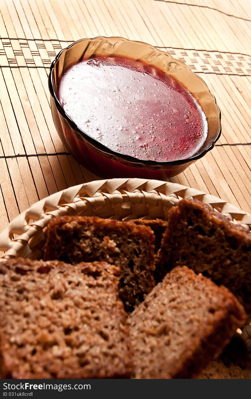 Bowl of fresh soup with black bread. Bowl of fresh soup with black bread