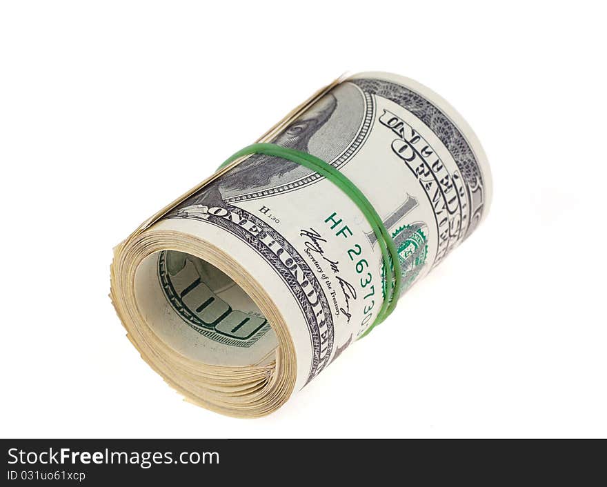 Rolled $100 dollar bills on white background