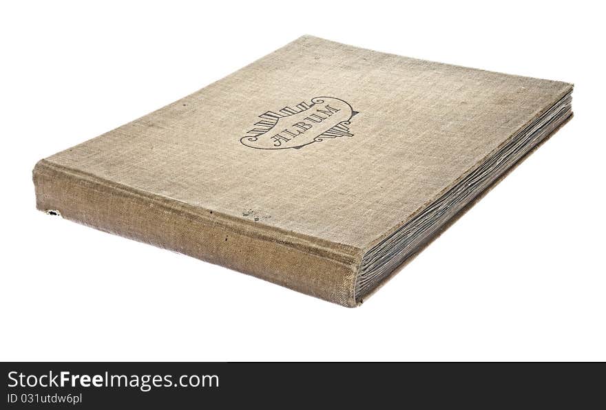 Old worn photograph album isolated against a white background