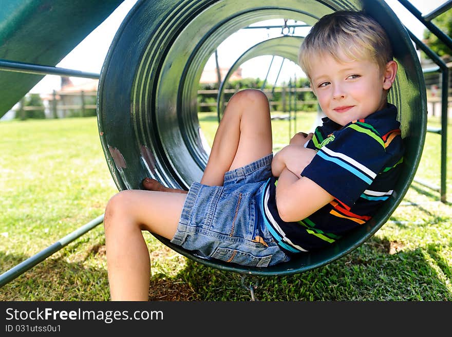 Cute boy in playground