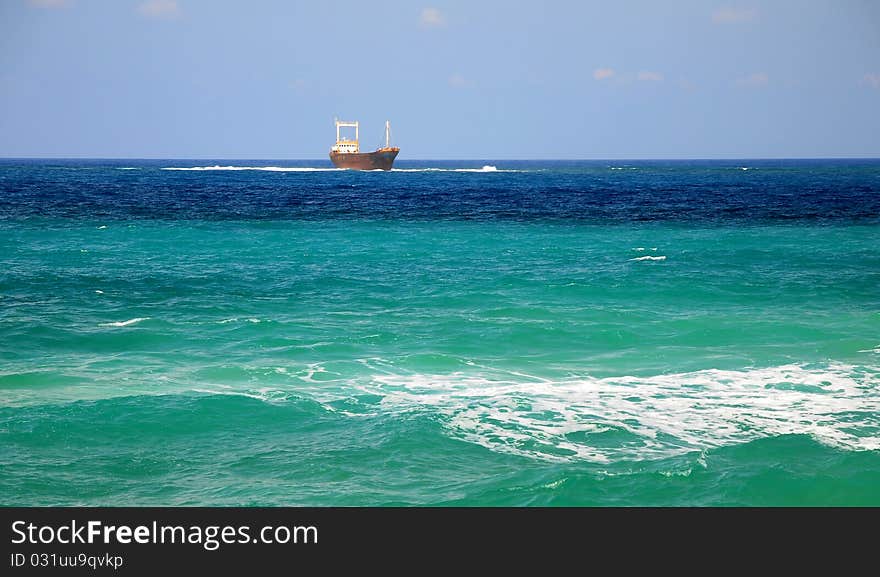 Old rusty ship off the coast of Cyprus. Old rusty ship off the coast of Cyprus