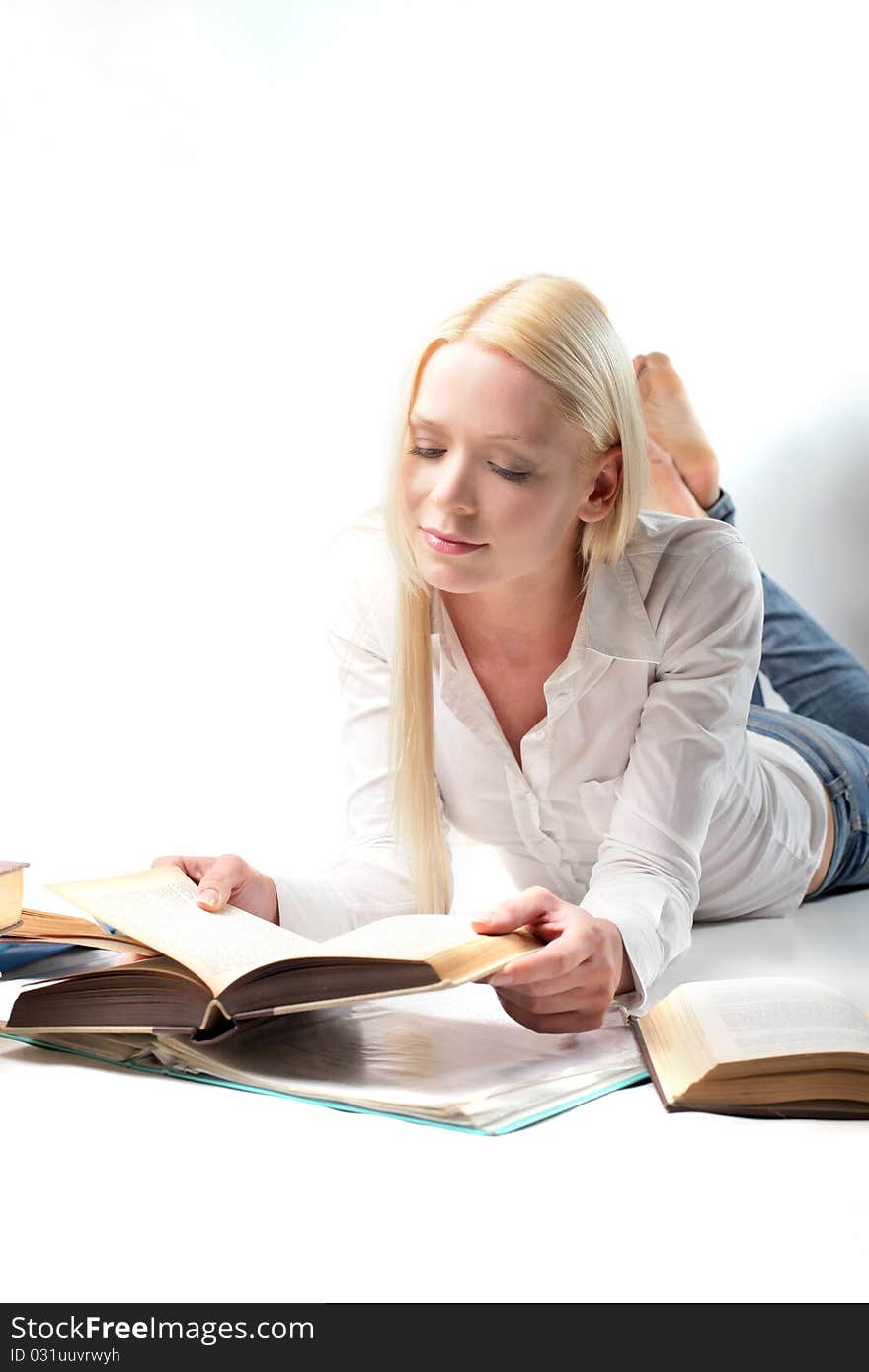 Portrait of a young woman studying