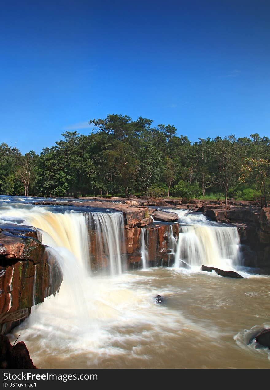 Waterfall Tadtone in climate forest of Thailand top perspective, vertical. Waterfall Tadtone in climate forest of Thailand top perspective, vertical